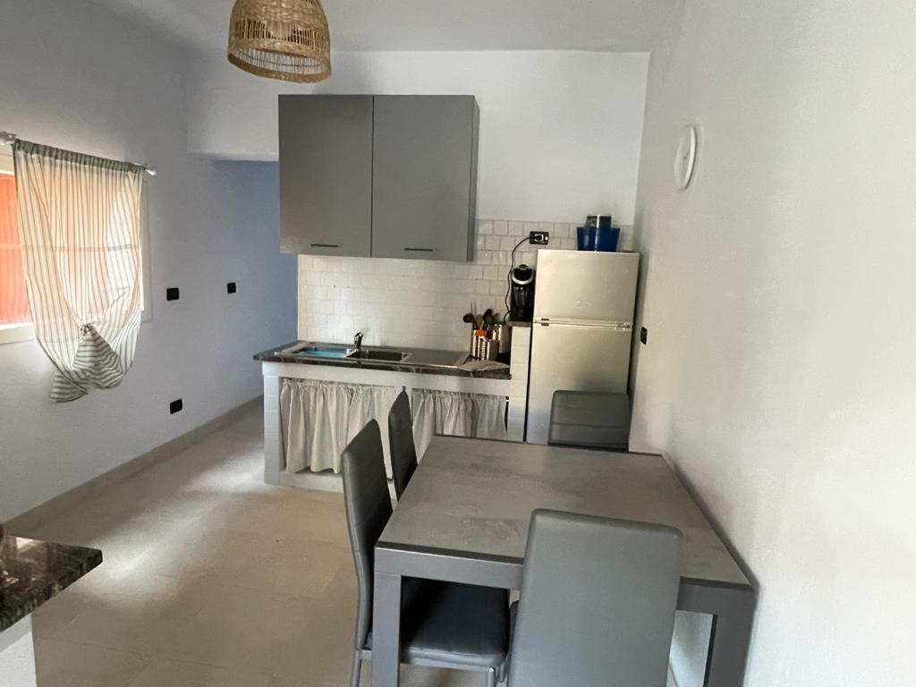 Azzurra House Apartment มารินาดิปิซา ภายนอก รูปภาพ