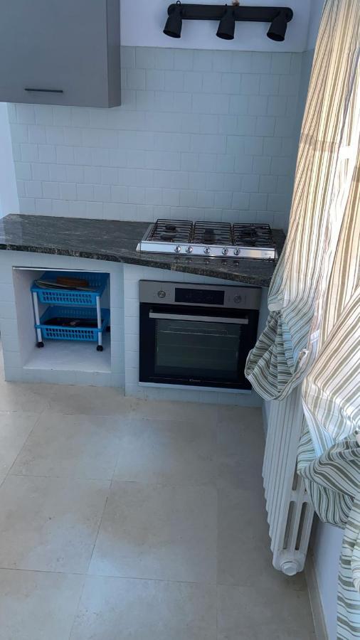 Azzurra House Apartment มารินาดิปิซา ภายนอก รูปภาพ