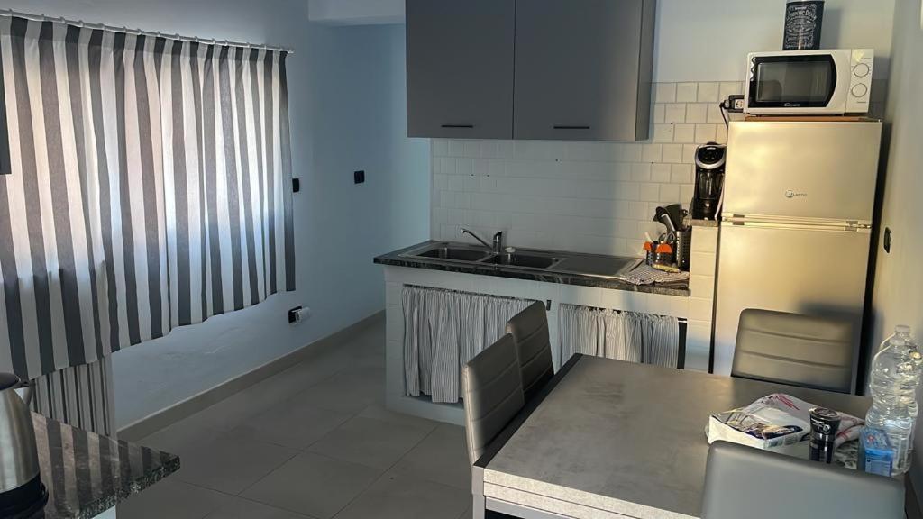 Azzurra House Apartment มารินาดิปิซา ภายนอก รูปภาพ